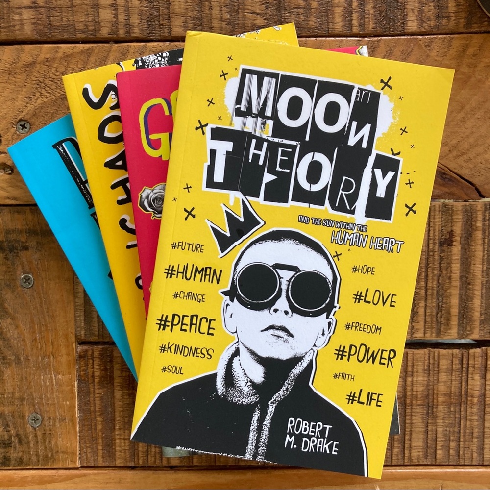 Set of 4 books by poet R.M. Drake